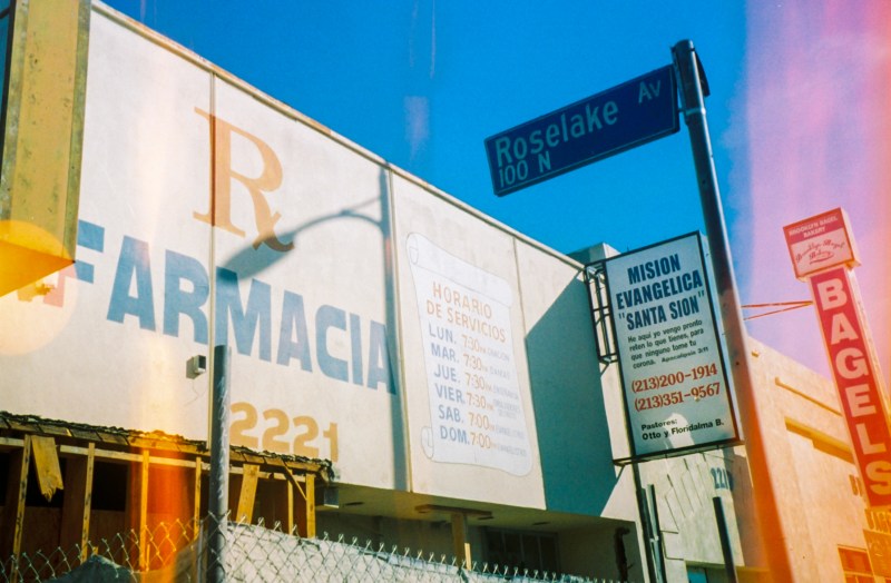 The farmacia in this photo is now Brooklyn Bagels.