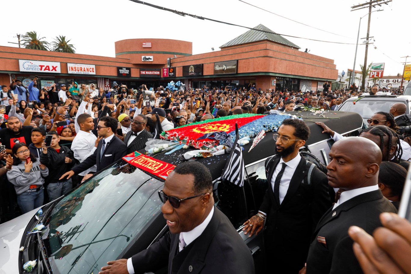 Thousands gather for emotional farewell to slain rapper Nipsey Hussle