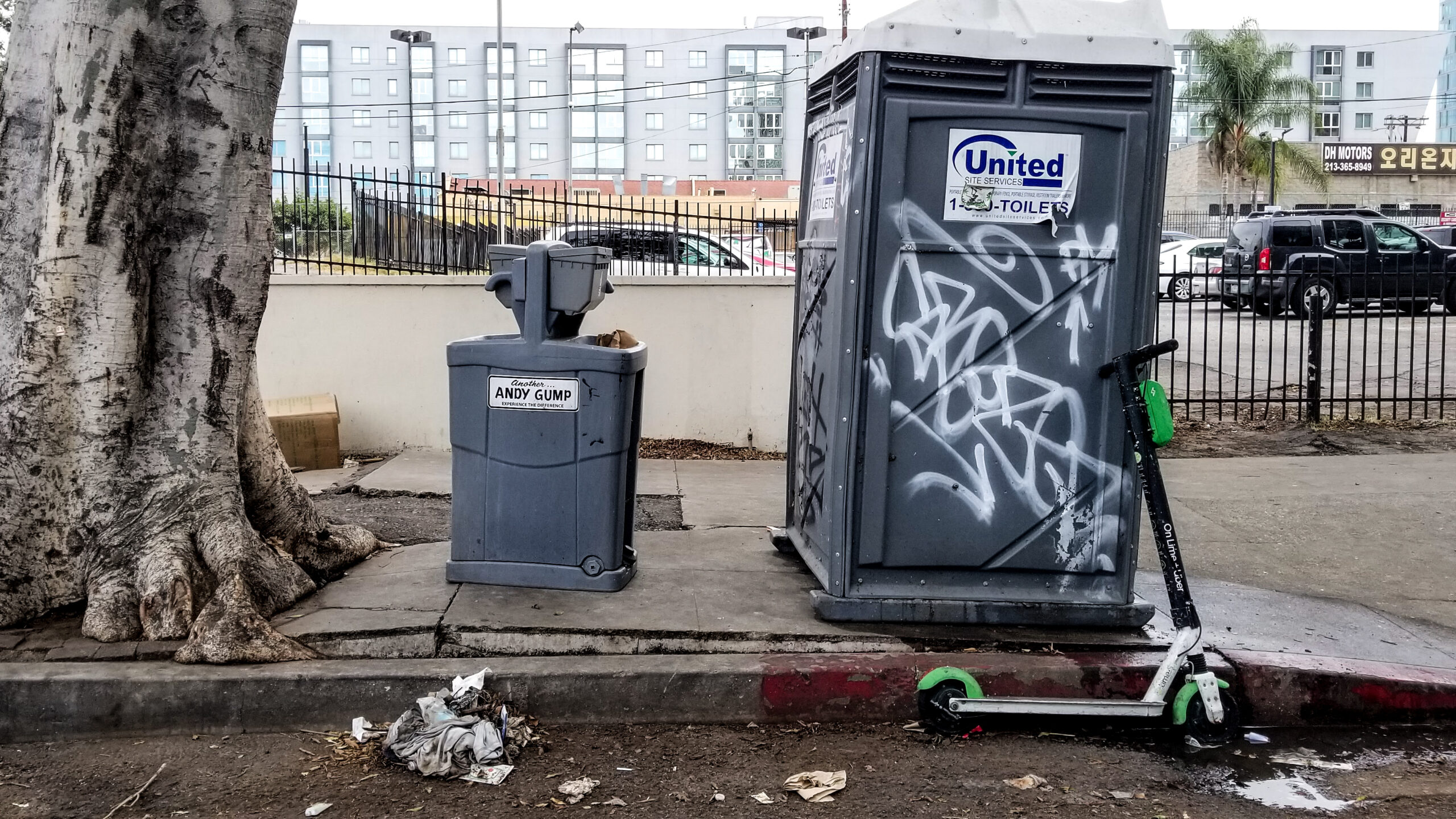 A portable sink and toilet on a sidewalk in Koreatown (2021)