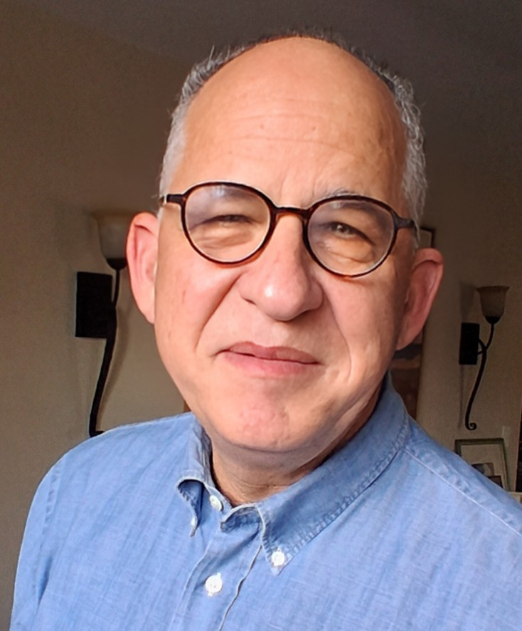 a portrait of a man in glasses