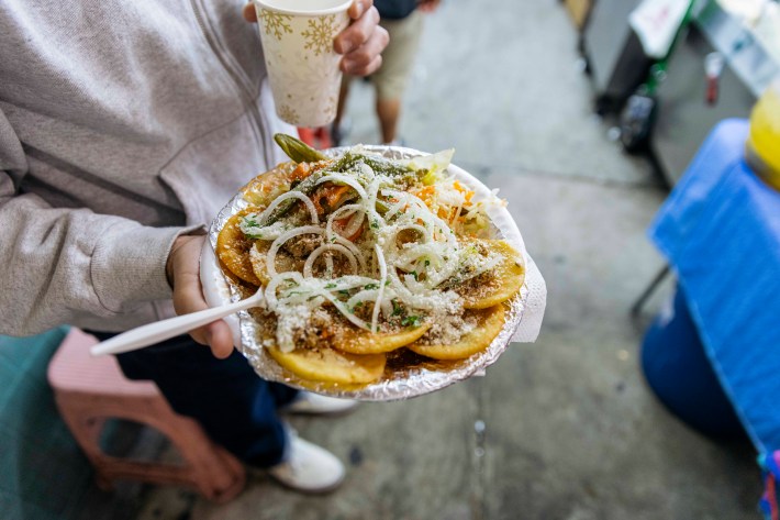 Onion-topped garnachas at MacArthur Park.