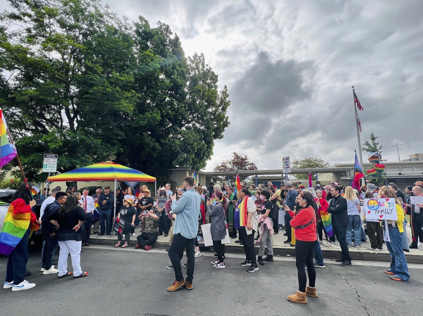 LGBTQ rights supporters gather outside of Saticoy Elementary in North Hollywood.