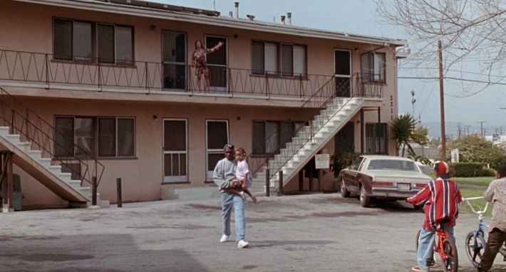 Lucky takes his daughter, Keisha (Shannon Johnson), home with him. Screenshot via Columbia Pictures.