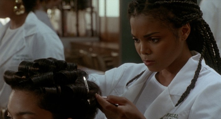 Justice, training at the Universal School of Beauty. Screenshot via Columbia Pictures.