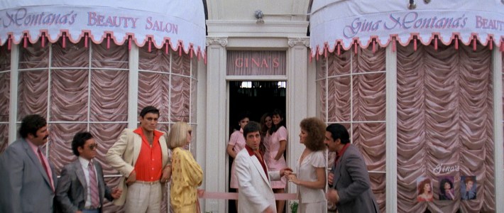 The grand opening of Gina Montana’s Beauty Salon. Screenshot via Universal Pictures.