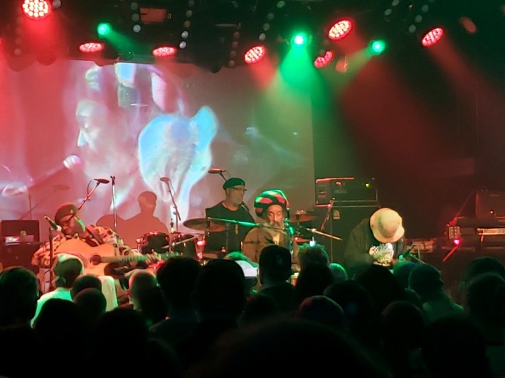 Jah Faith leading a Nyabinghi to start a benefit for Bad Brains singer HR in Los Angeles, with Santa Davis on drums