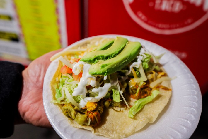 An open taco de flor de calabaza at El Flamin Taco. Photo by Noe Adame for L.A. TACO.