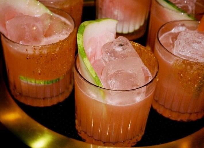 A watermelon-rind garnished pink cocktail from West Hollywood's Irie and Hind