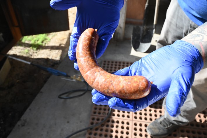 A handmade sausage at A's BBQ pop-up.