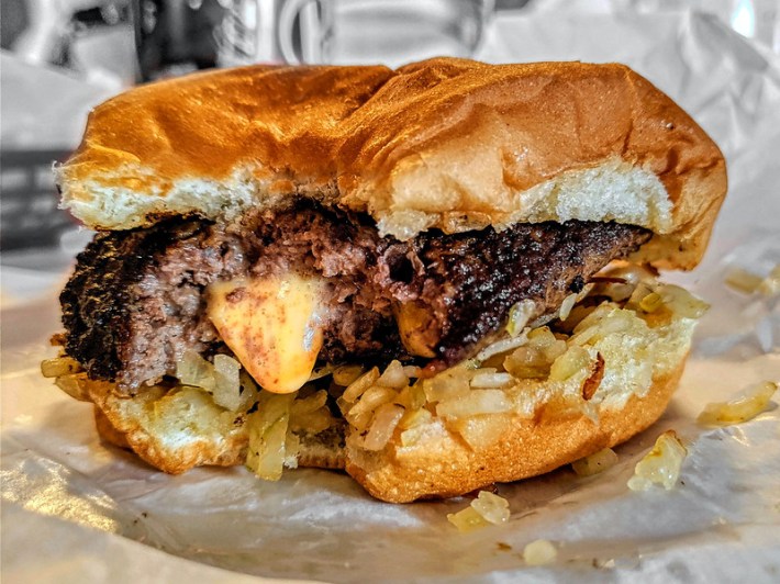 A cheese-oozing Juicy Lucy burger