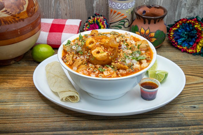 A big bowl of menudo with cow's foot from Mr. Menudo in Los Angeles