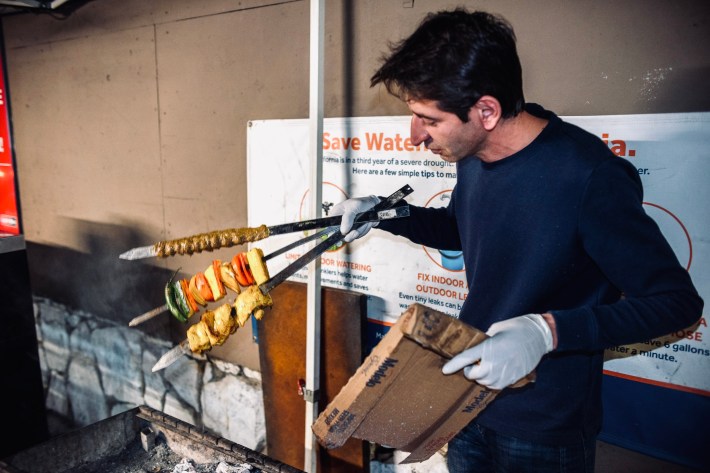 Hussein Akbar showing off his three styles of Persian kebabs in West L.A.