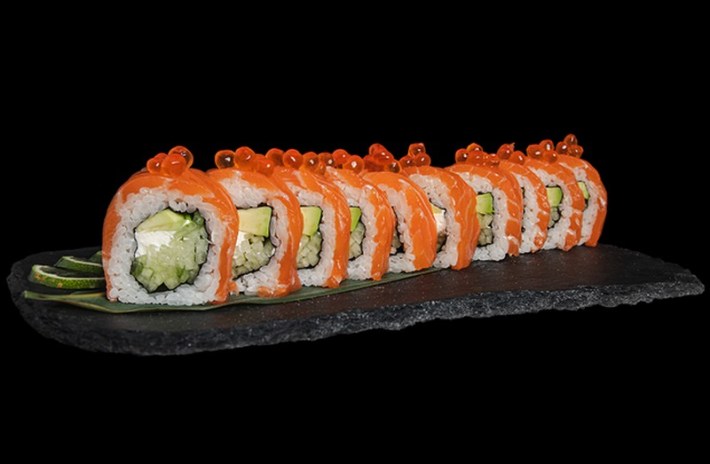 Philadelphia salmon roil from Kakkoi sushi, a sushi roll topped with salmon roe
