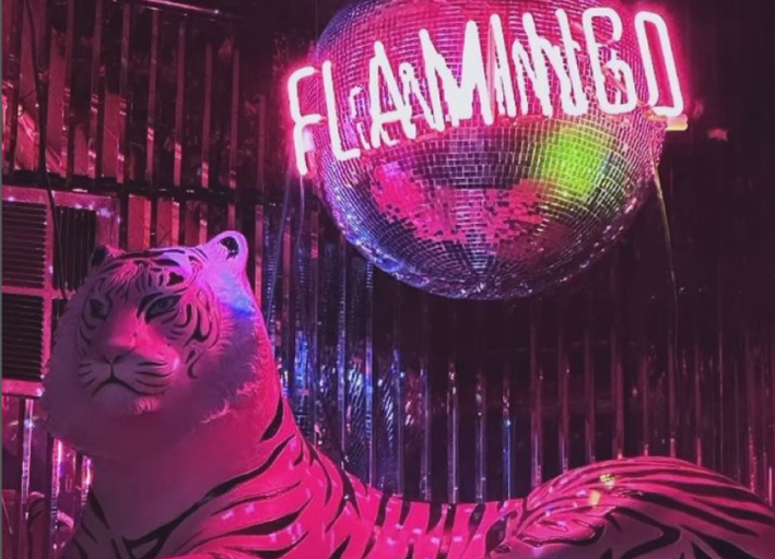 A tiger statue under a disco ball at Flamingo Bar in Downtown L.A.