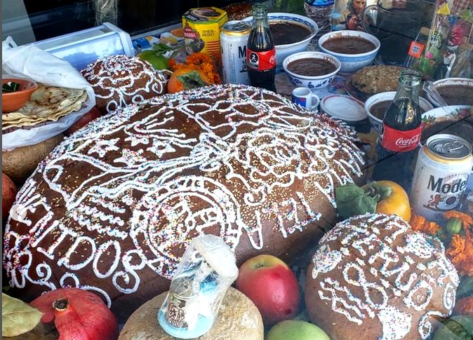Pan de muerto and offerings for the departed at Antequera Bakery in Santa Monica