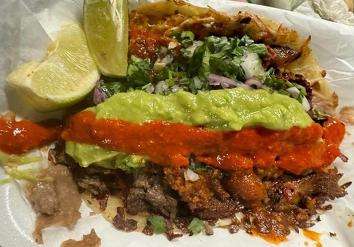 A five-meat taco at El Ruso with chorizo, asada, adobada, chicharrón, and chile colorado