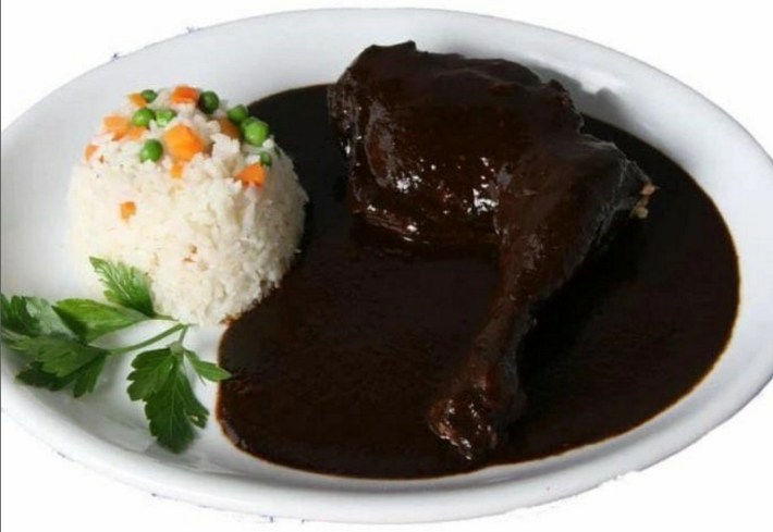 Mole negro with chicken and a side of rice with vegetables from Maria Sabina Restaurante in Whitter