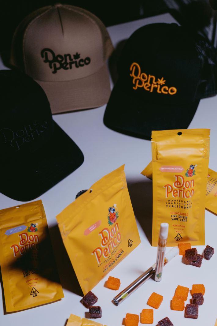 Hats, bags, and vapes from Don Perico's line of merchandise and cannabis products