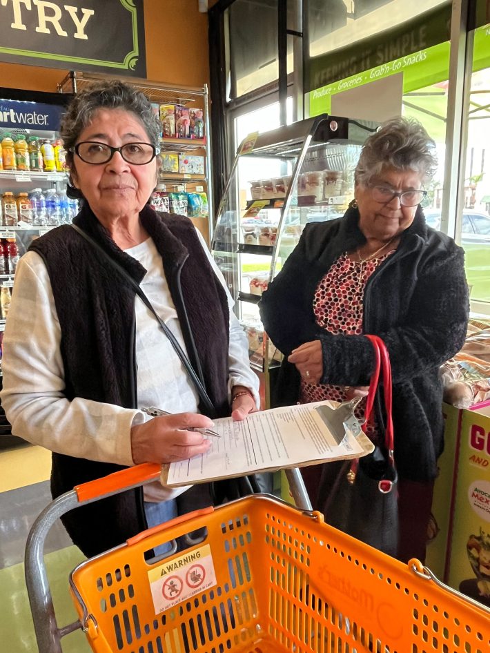 Martha Ruano and Macaria Palacios shop at the Mother's Nutritional Center store in Compton.