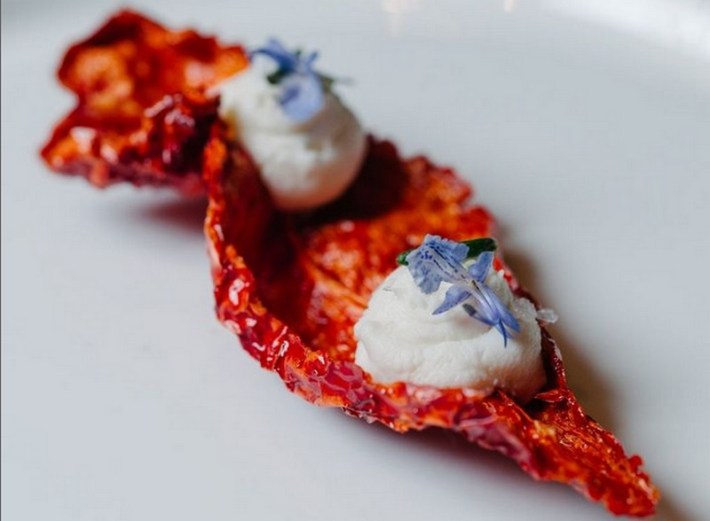 Puffed cruscho peppers with whipped ricotta and flowering rosemary at Stella
