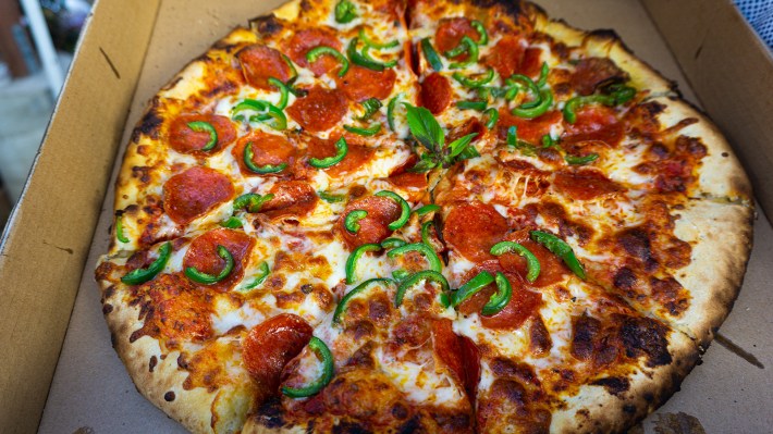 A freshly baked pizza at Hugo's. Photo by Janette Villafana for L.A. TACO.