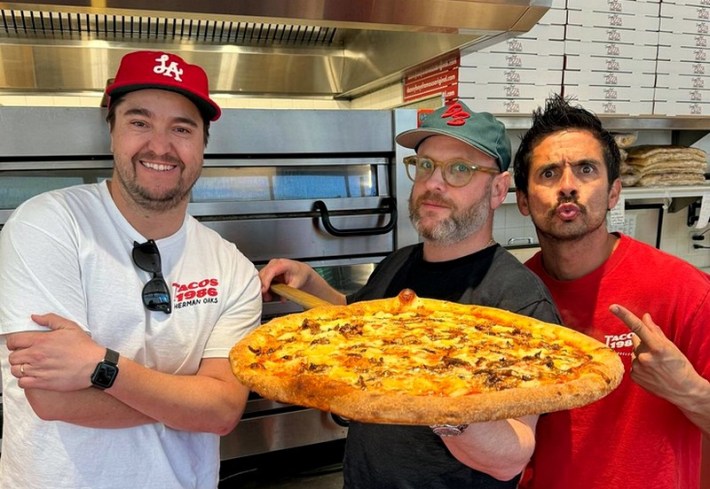 Danny Boy's Pizza chef Daniel Holzman flanked by the owners of Tacos 1986