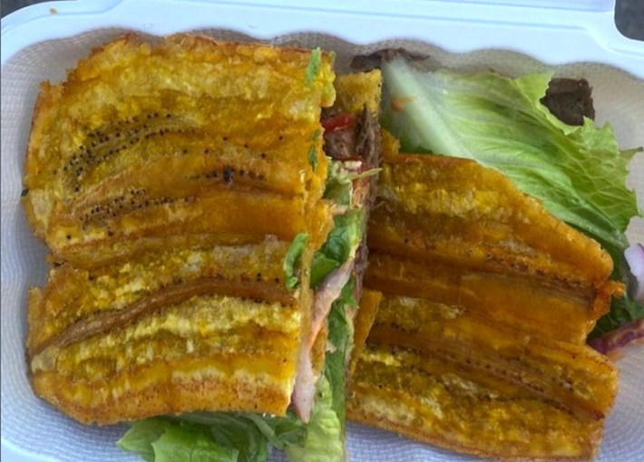 An open faced plantain sandwich