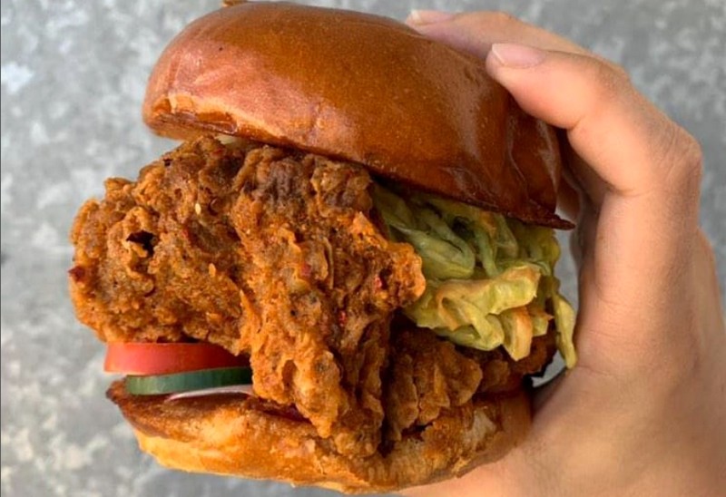 Salvadoran fried chicken sandwich with relaj