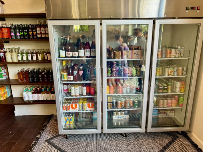 The non-alcoholic refrigerated section at De La Playa. Photo by Javier Cabral for L.A. TACO.