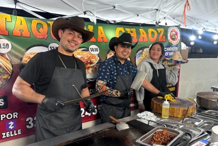 Three taqueros at a West L.A. taco stand. Two in cowboy hats.