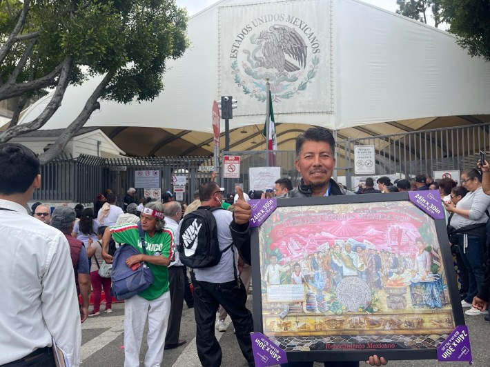 Voters were sitting on dressers on the street. Photo by Abraham Márquez for L.A. TACO.