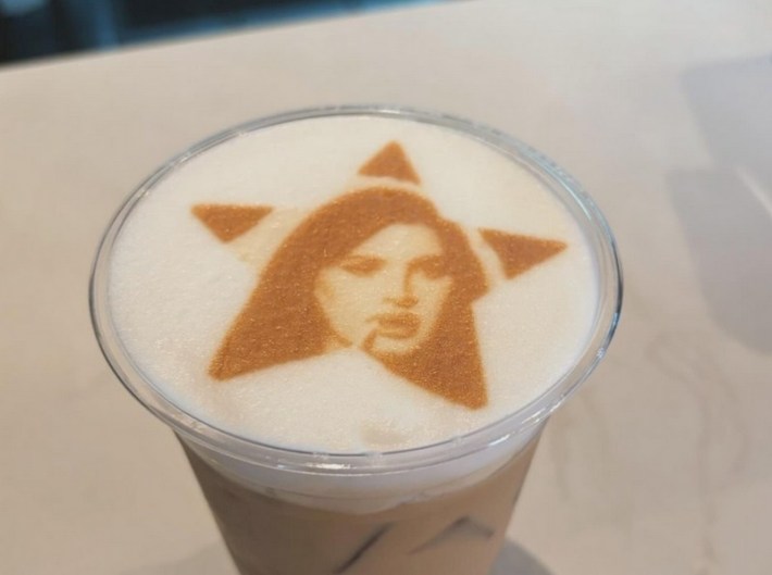 Lana Del Rey's stenciled face on top of a coffee at Mexes Cafe in East Los Angeles.