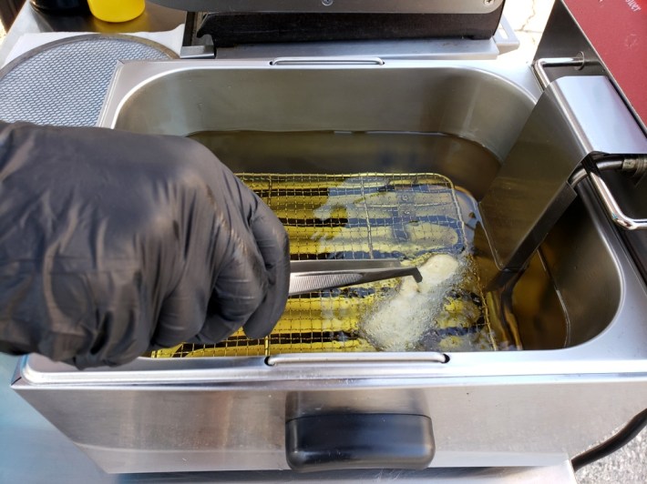 Razo frying fish in sunflower oil