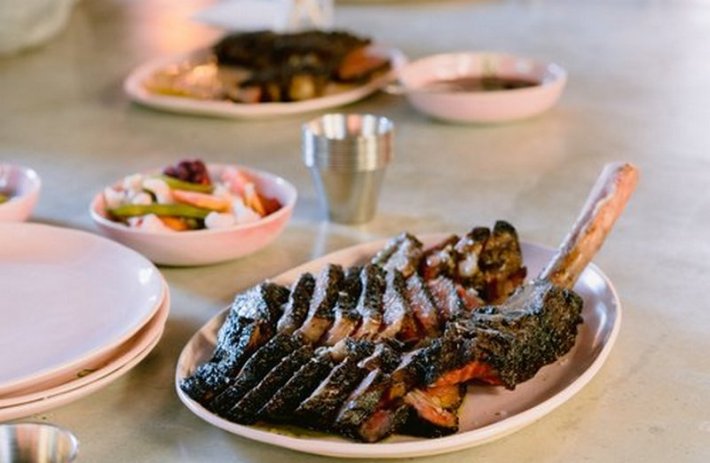 A slice ribeye steak on a plate