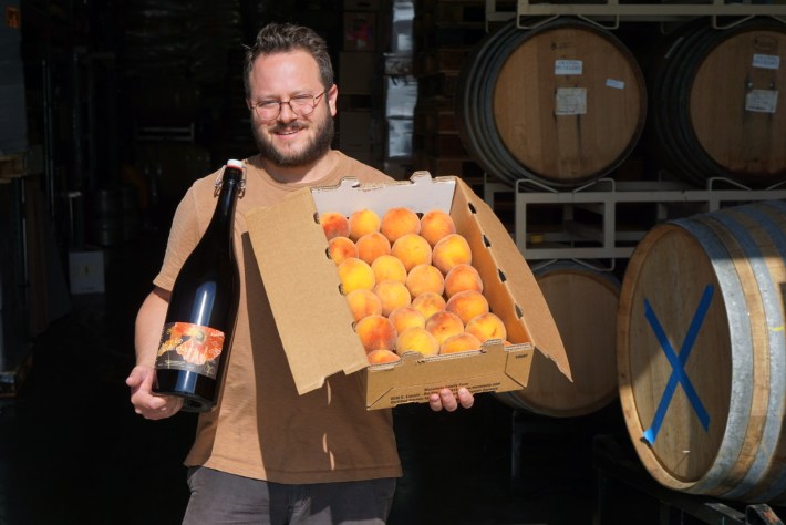 Alex Ourieff of Cellador Ales and a magnum of his Matsumoto beer.