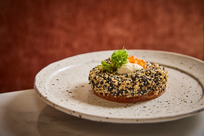 Shrimp toast with ikura and citrus aioli, covered in sesame seeds