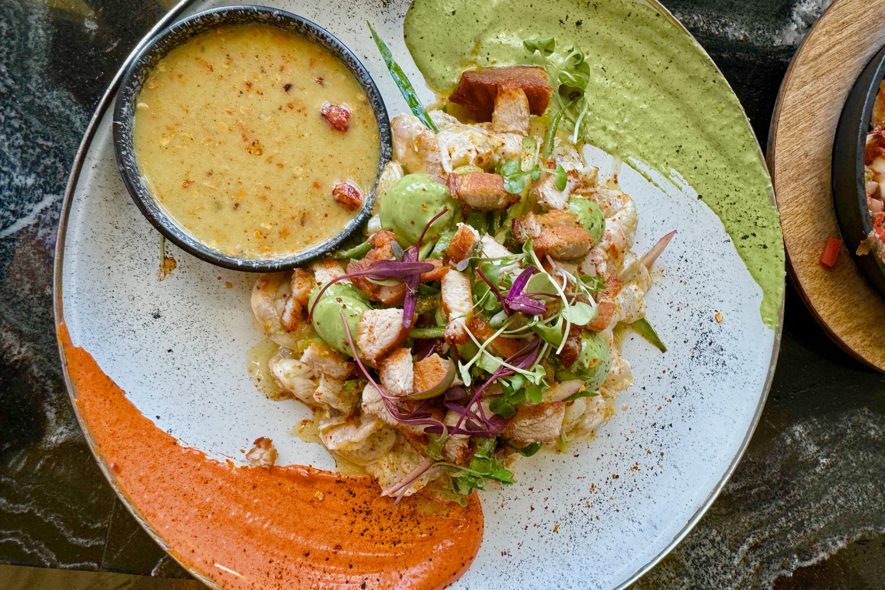 Aguachile de camarón with crispy pork belly chicharrón. Photo by Javier Cabral for L.A. TACO.