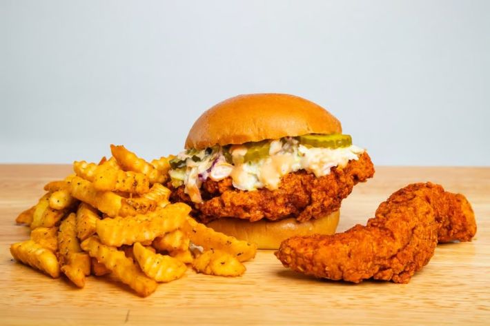 Fried chicken sandwich, chicken tender, and crinkle fries