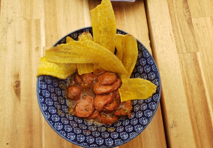 A bowl of ceviche de chorizo with plantain chips at Colombia Parce in Boyle Heights