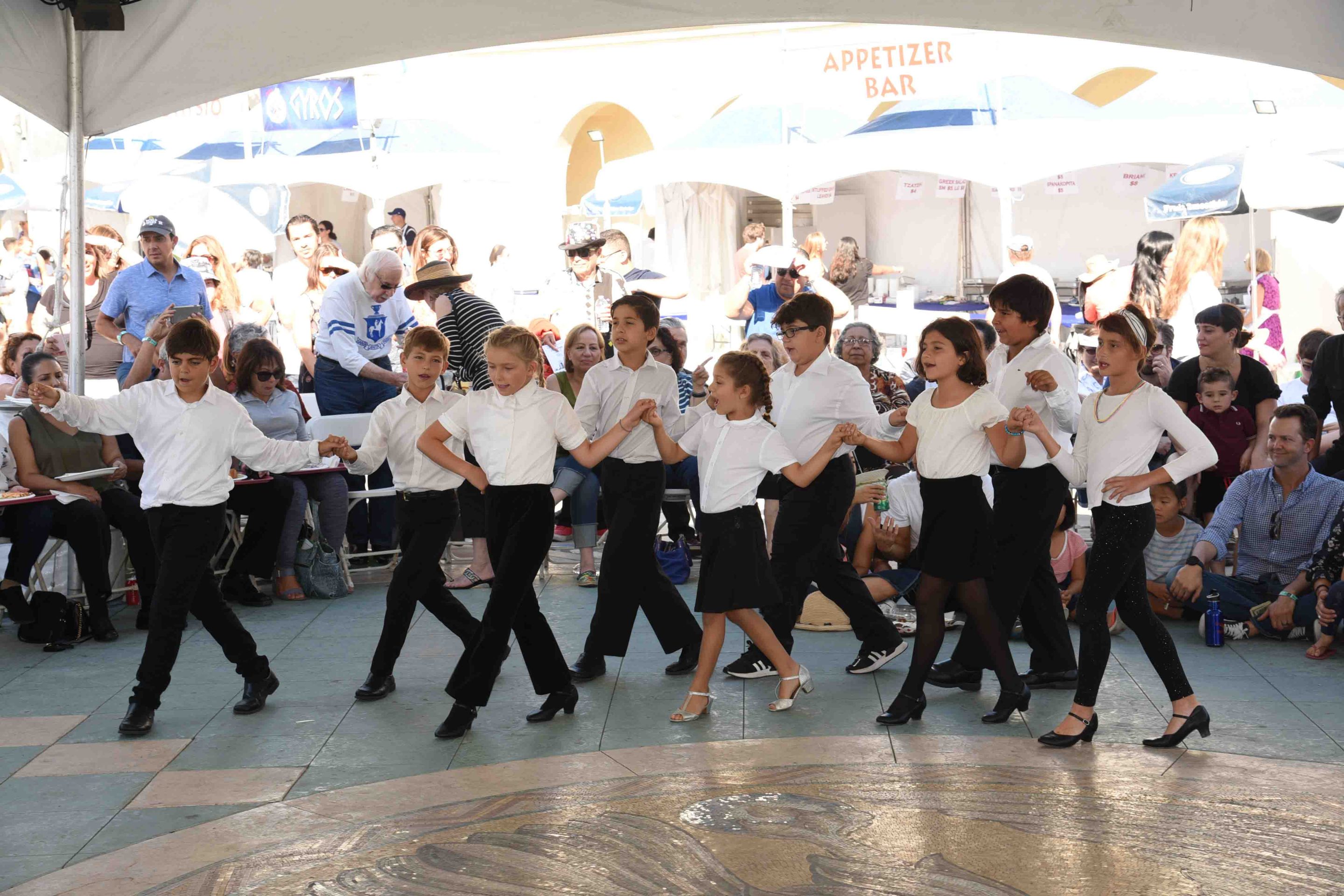 Kids doing traditional Greek dancing at the L.A. Greek Fest, photo via The L.A. Greek Fest