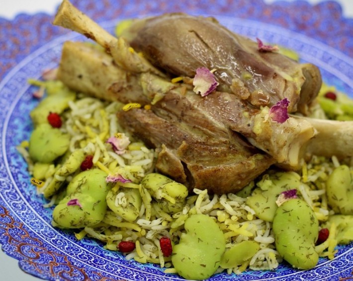 Braised lamb shank on rice with lima beans at Kuku Cafe