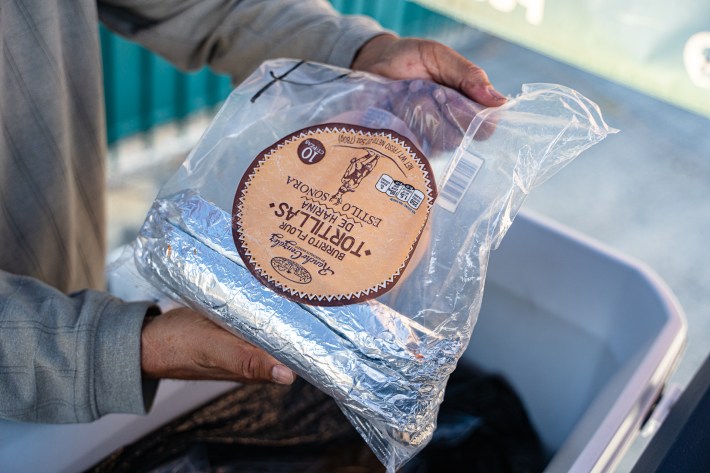 A tortilla bag repurposed to hold burritos. Photo by Memo Torres for L.A. TACO.