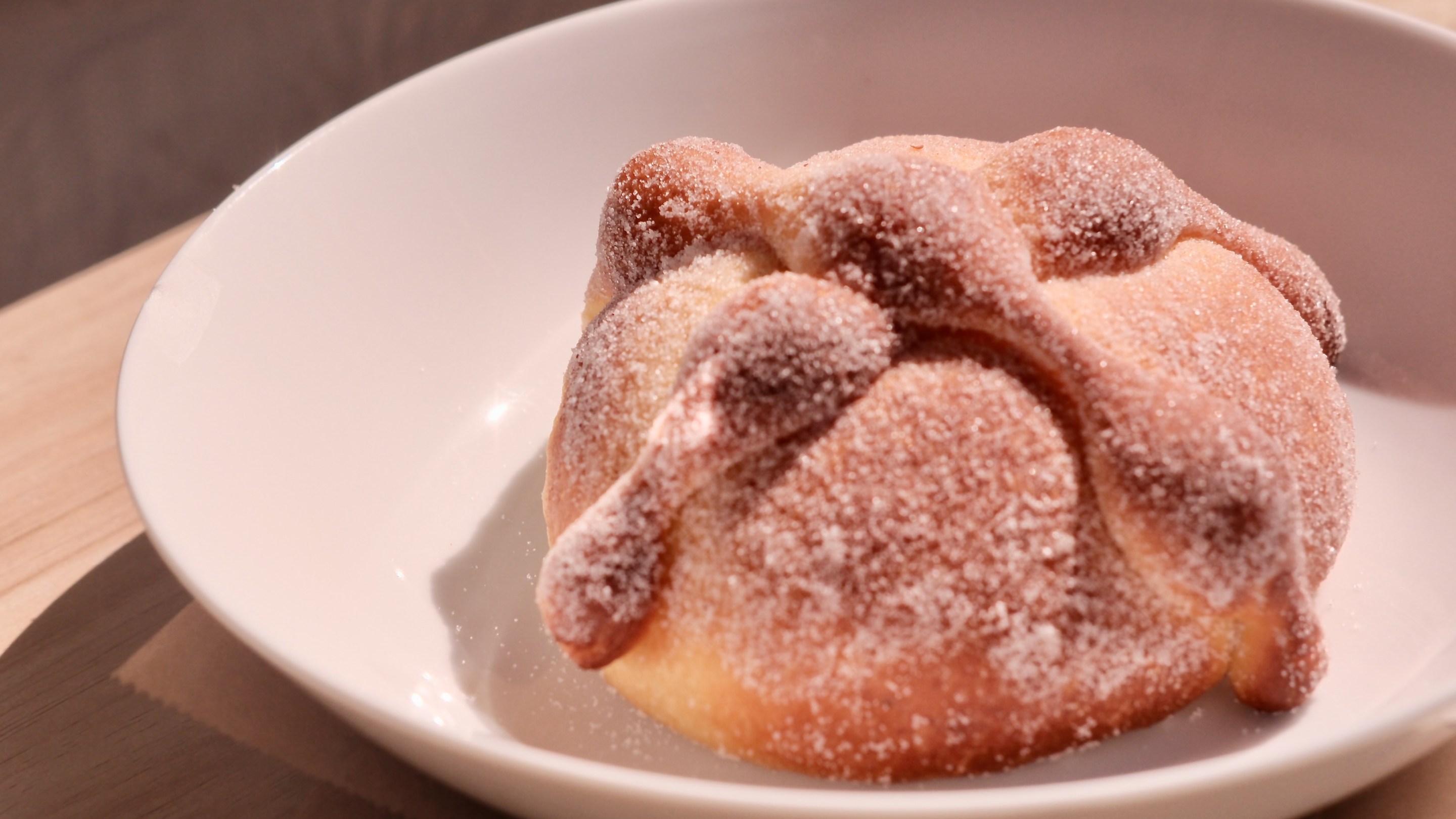 Pan de Muerto from Gusto with vanilla-rose petal sugar. Photo by Javier Cabral for L.A. TACO.