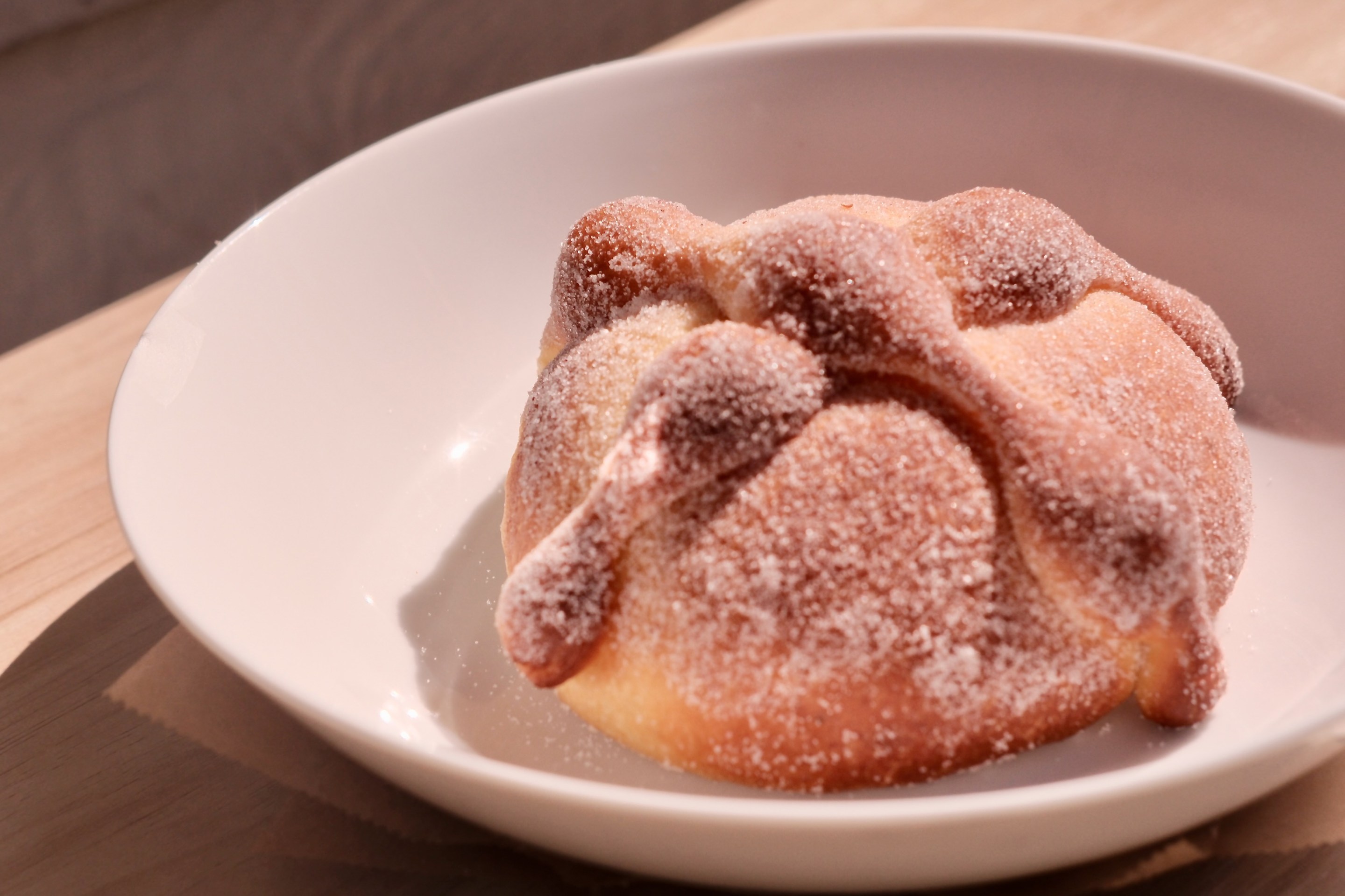 Pan de Muerto from Gusto with vanilla-rose petal sugar. Photo by Javier Cabral for L.A. TACO.