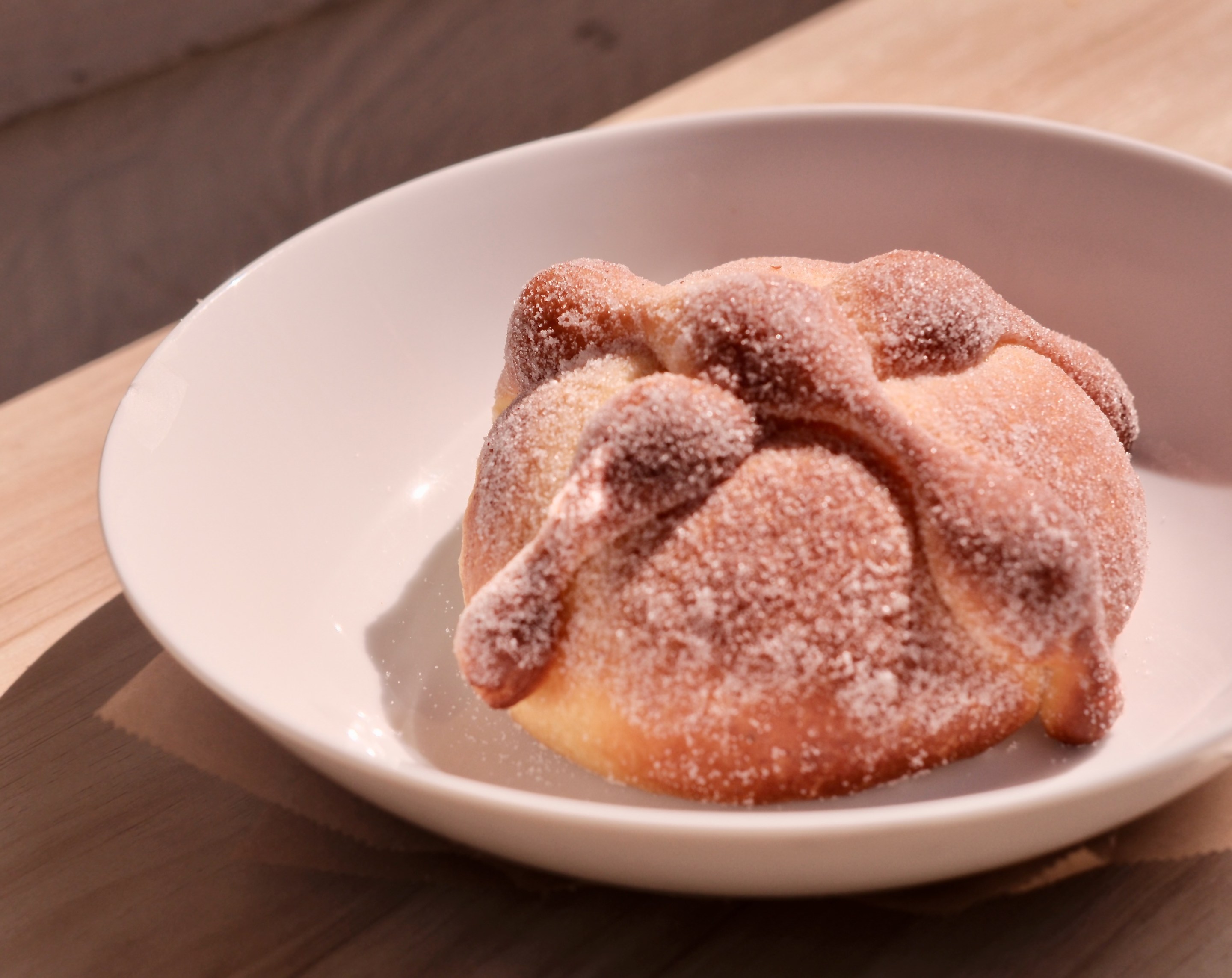 Pan de Muerto from Gusto with vanilla-rose petal sugar. Photo by Javier Cabral for L.A. TACO.
