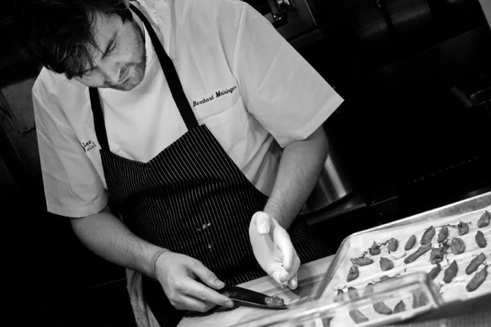 Chef Bernhard Maingher cooking at Lustig