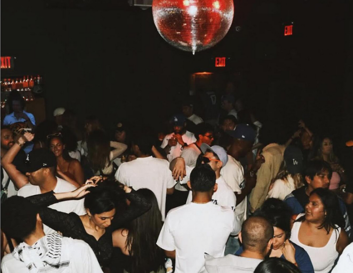 Couples dancing under a disco ball at Short Stop in Echo Park.