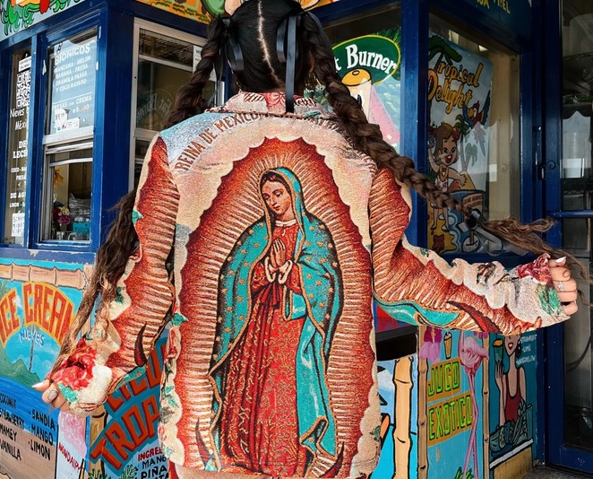 A colorful jacket with La Virgen de Guadalupe on the back.