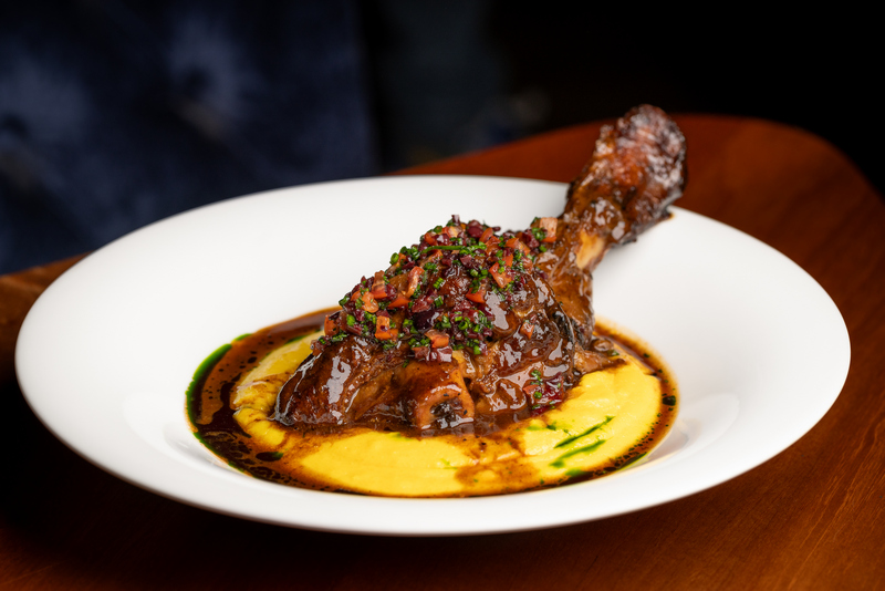 Somerville's braised lamb shank with saffron polenta.