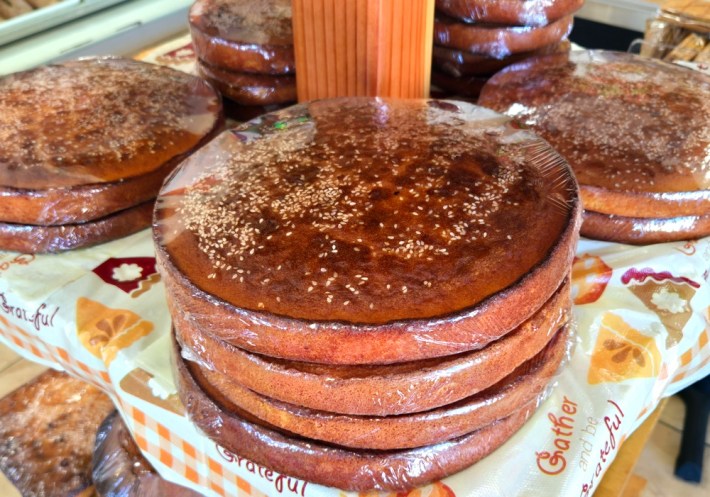 Plastic wrapped Salvadoran quesadillas.